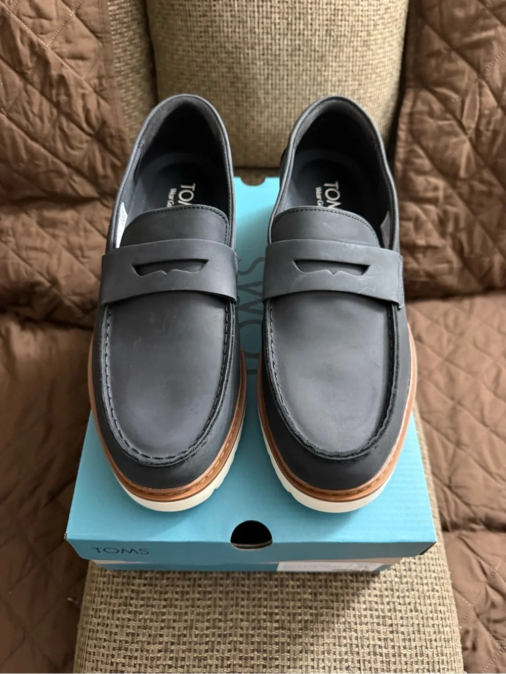 TOMS Black Leather Penny Loafers with Tan Welt and White Sole